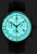 Montre homme avec cadran turquoise, bracelet en cuir noir et indicateurs d'alarme chronographe
