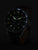 Montre habillée pour homme avec cadran vert et index luminescents