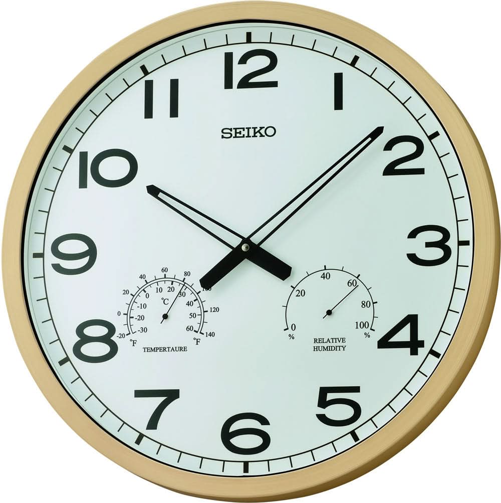 Horloge murale avec cadre en plastique beige, cadran blanc, chiffres et aiguilles noirs, Seiko