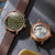 Herren-Armbanduhr mit grünem Zifferblatt und sichtbarem Uhrwerk, braunes Lederband