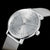 Sternglas Naos XS Uhr mit silbernem Gehäuse, weißem Zifferblatt und Mesh-Armband