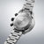 Seiko Prospex Herrenuhr mit Sichtboden, Edelstahlarmband und Gehäusegravur auf der Rückseite.