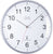 Horloge murale radio-pilotée avec cadran blanc et cadre gris, chiffres et aiguilles ronds