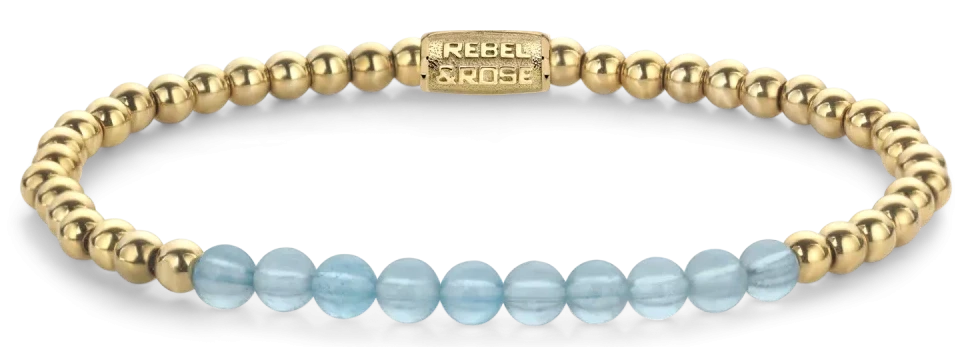 Bracelet avec perles d'aigue-marine bleu clair et intercalaires en acier inoxydable doré