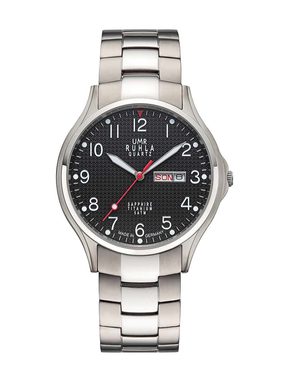 Montre pour homme avec cadran noir, points luminescents et bracelet en métal, affichage analogique