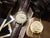 Montre unisexe avec cadran beige et bracelet en cuir marron, couronne visible