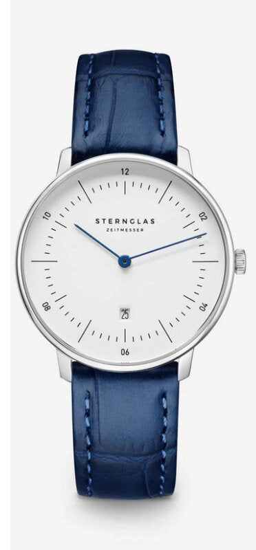 Montre pour femme STERNGLAS avec boîtier rond argenté, bracelet en cuir bleu et cadran blanc.