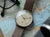 Montre homme avec cadran beige et bracelet en cuir marron, lunette or rose.