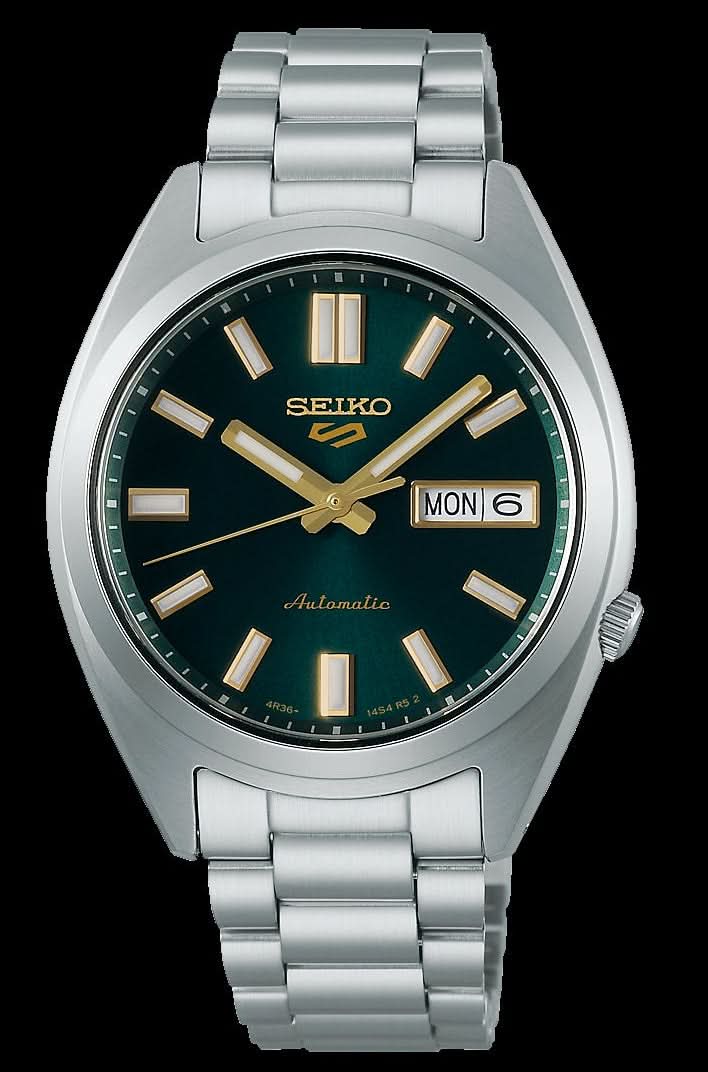 Montre bracelet pour homme avec bracelet en métal argenté, cadran sombre et affichage de la date « LUN 6 ».