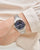 Seiko Damenuhr mit silbernem Metallarmband und blauem Zifferblatt, Saphirglas