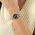 Damenarmbanduhr mit grünem Zifferblatt und bicolor Edelstahlarmband, runde Lünette
