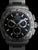 Herren-Chronograph mit schwarzem Zifferblatt, grünen Indizes und Edelstahlband