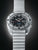 Herrenarmbanduhr SEIKO 5 Sports mit schwarzem Zifferblatt und geriffelter Lünette