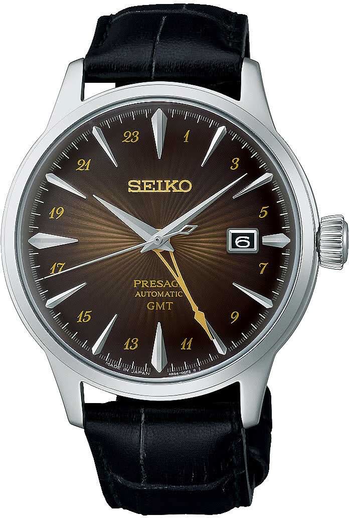 Montre homme avec bracelet en cuir noir et cadran marron, lunette argentée