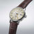 Seiko Presage Herrenuhr, braunes Lederband, beiges Zifferblatt mit GMT-Markierung