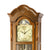 Pendule en noyer avec cadran visible, chiffres romains et mouvement à balancier