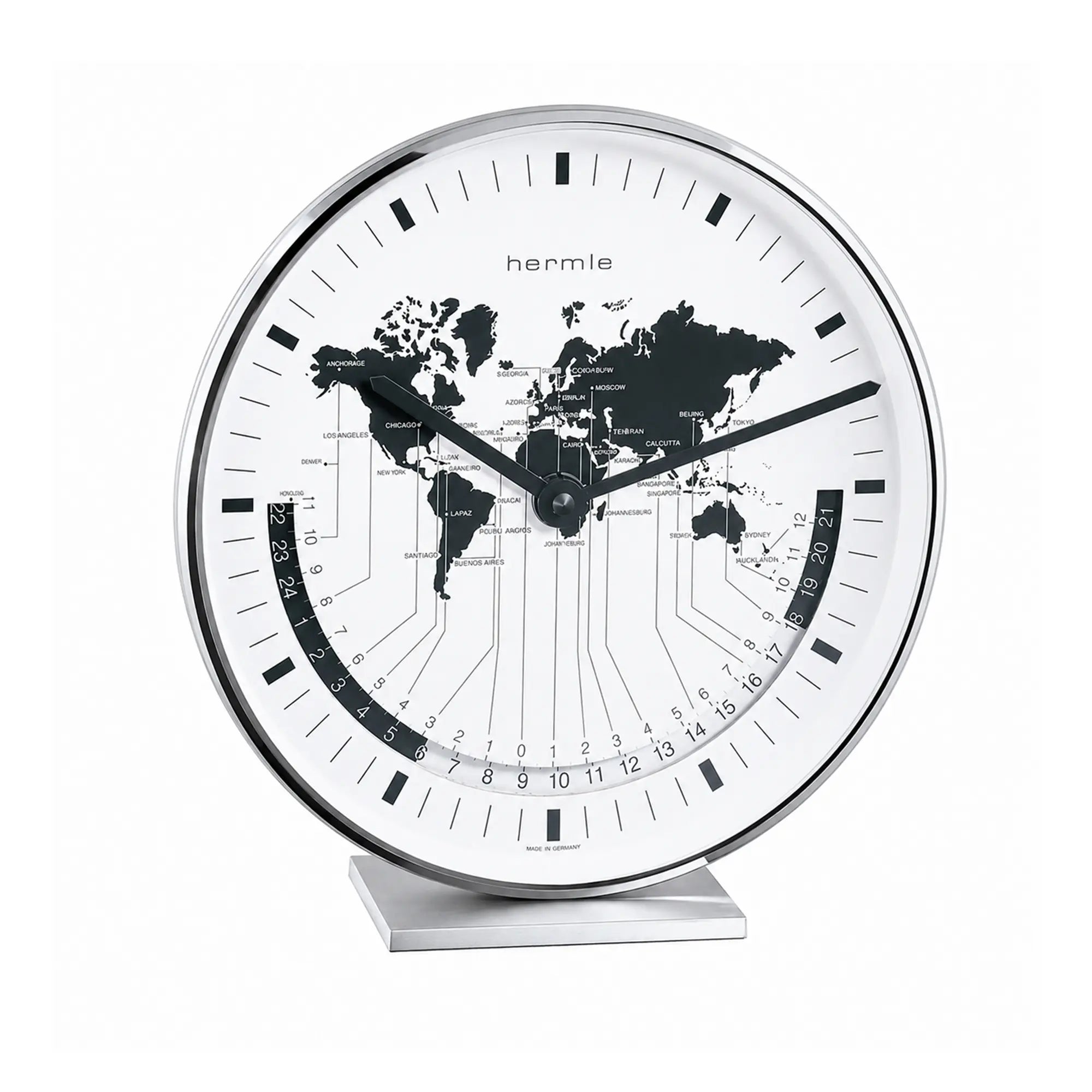 Horloge de table métallique avec cadran blanc et carte du monde, aiguilles et échelle noires