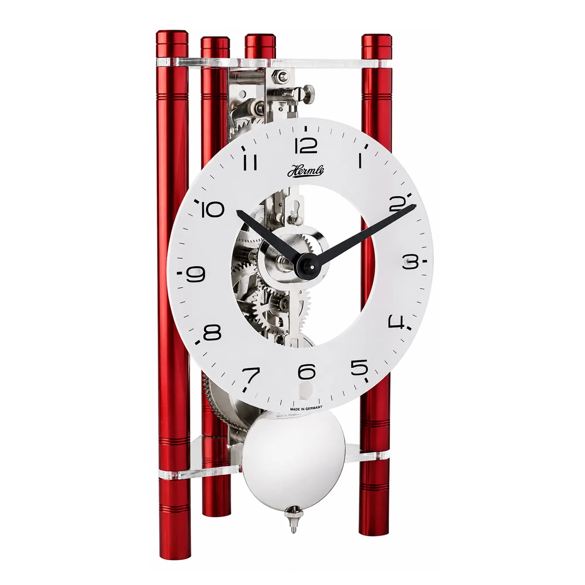 Horloge de table squelette avec cadran blanc, mécanisme visible et colonnes rouges