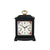 Horloge de table noire avec cadran floral et poignée dorée, remontage mécanique