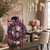 Horloge de table avec cadre violet et chiffres ornés, mouvement visiblement monté