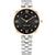 Tommy Hilfiger Damenarmbanduhr: schwarzes Zifferblatt, römische Zahlen, goldfarbene Lünette, Stahlband.