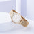 Damenarmbanduhr mit breitem goldfarbenem Meshband, rundes Zifferblatt, schlicht