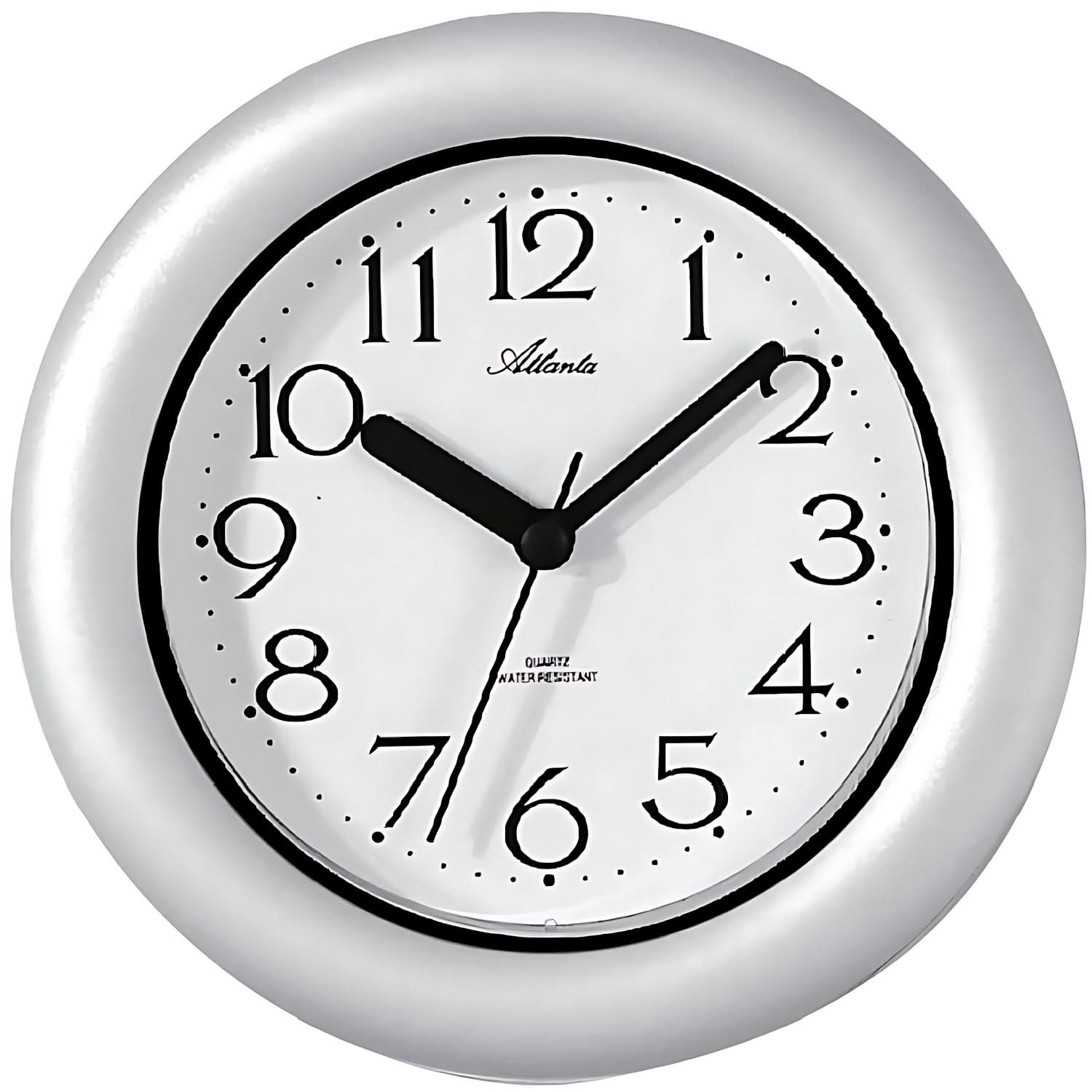 Horloge murale argentée avec cadran blanc, chiffres et aiguilles noirs, ronde de 17 cm