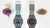 Zwei G-Shock Uhren mit Textilarmbändern in petrol und grau, mit Digitalanzeigen.