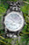 Montre pour femme avec bracelet rond en acier inoxydable argenté et index en diamant
