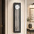 Horloge murale avec cadre noir et grand vitrage, cadran rond