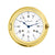 Horloge murale ronde avec cadre en laiton, cadran blanc et aiguilles bleues, chiffres romains.