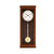 Horloge murale Hermle en bois avec cadran rond et poids de pendule dans une vitre