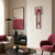 Horloge murale avec cadre rouge, couvercle de mouvement noir et pendule rouge