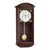 Horloge murale en bois brun foncé avec cadran rond et pendule