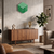 Horloge murale en acrylique en forme de cube vert avec aiguilles et chiffres blancs, fixation murale