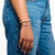 Bracelet jonc avec perles et breloque rose
