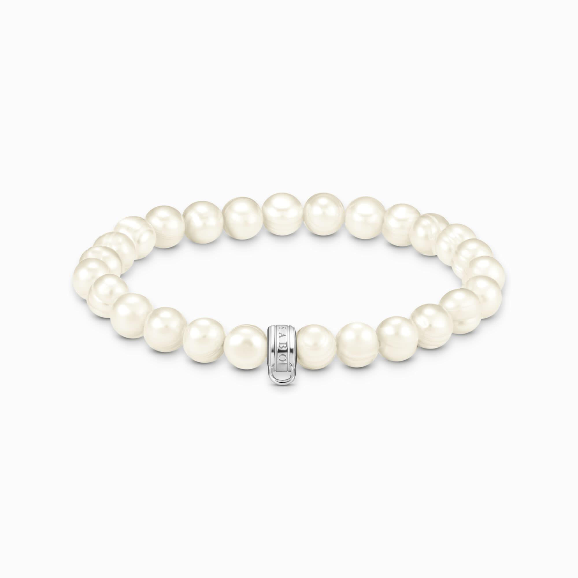 Bracelet avec perles de culture d'eau douce blanches et passant rond sur le fermoir