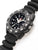 Herren-Armbanduhr mit schwarzem Zifferblatt, Leuchtindizes, Datumfenster und Kautschukband.