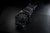 Montre Luminox pour homme avec bracelet noir et index lumineux verts sur le cadran.