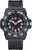 Montre homme avec boîtier noir, cadran noir et bracelet noir.