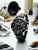 Herrenarmbanduhr mit schwarzem Lederband und roter Naht, schwarzes Chronograph-Zifferblatt