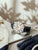 Herrenarmbanduhr Zeppelin Flatline mit schwarzem Lederband, creme Zifferblatt und blauen Zahlen
