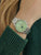 Zeppelin Herrenarmbanduhr mit Edelstahlgliederband und grünem Zifferblatt am Handgelenk