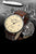 Herrenarmbanduhr Zeppelin mit beigem Zifferblatt, braunem Lederband und sichtbarem Gehäuse