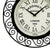 Detail der AMS Funk-Wanduhr: cremefarbenes Zifferblatt, schwarze Zeiger und Ornamentrahmen