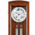 Horloge murale en bois avec façade en verre, boîtier marron, cadran rond et pendule