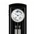 Horloge murale avec cadre noir, cadran rond et balancier